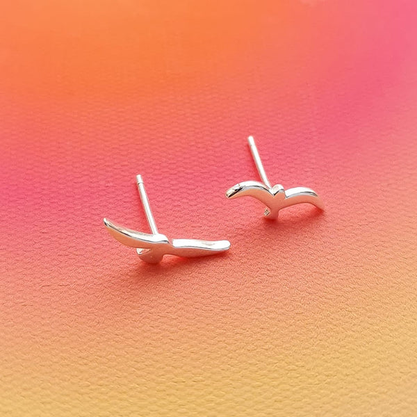 Brincos mini em aço inox prateado andorinhas prateadas PAMPA MIA ®