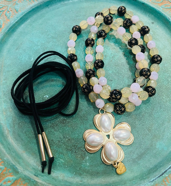 Fio preto de atar & fio cruz e pérolas