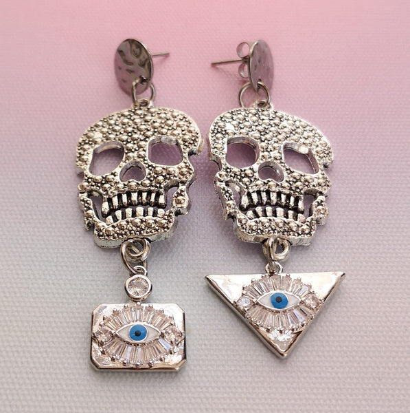 Brincos caveira e olho turco PAMPA MIA ®