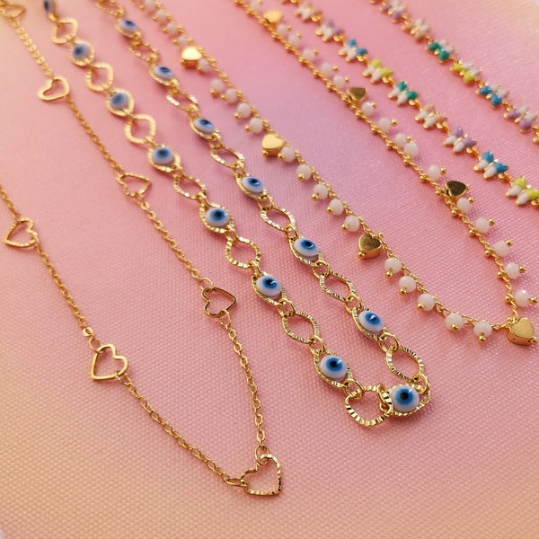 Fios curtos dourados com varios formatos & pendentes PAMPA MIA ®