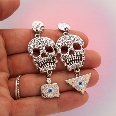 Brincos caveira e olho turco PAMPA MIA ®