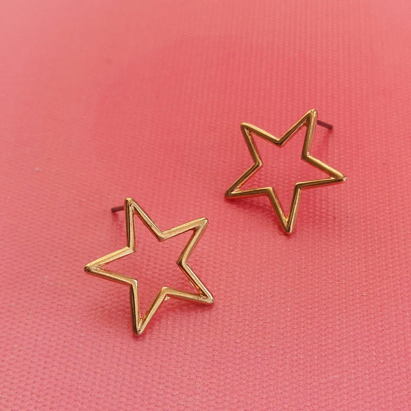 Brincos estrelas abertas