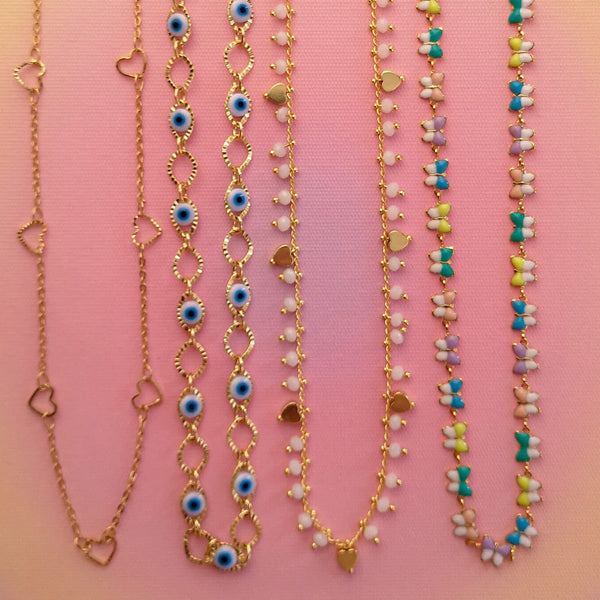 Fios curtos dourados com varios formatos & pendentes PAMPA MIA ®